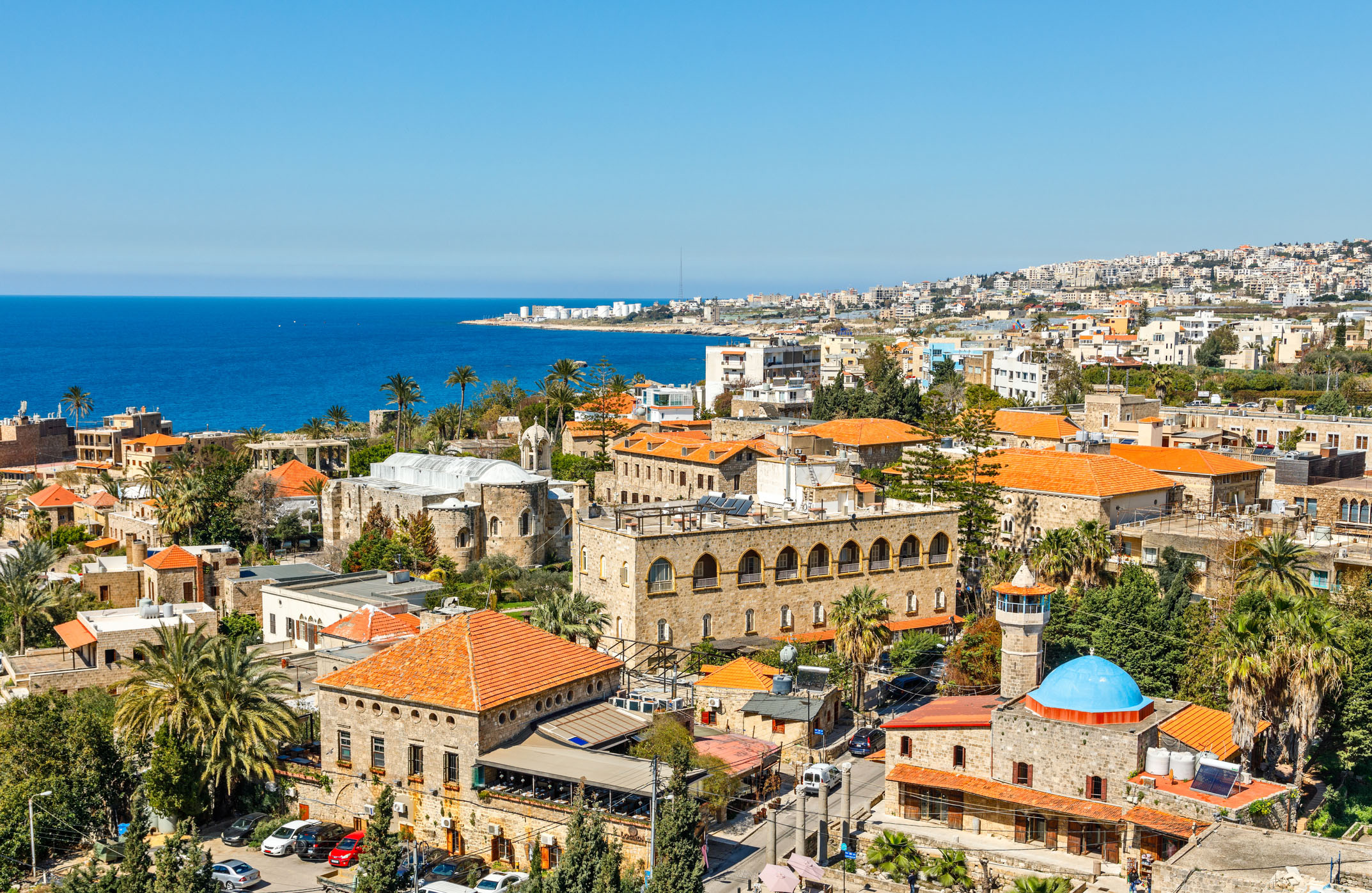 Mediterranean city historic center panorama with old church and mosque and residential buildings in the background, Biblos, Lebanon