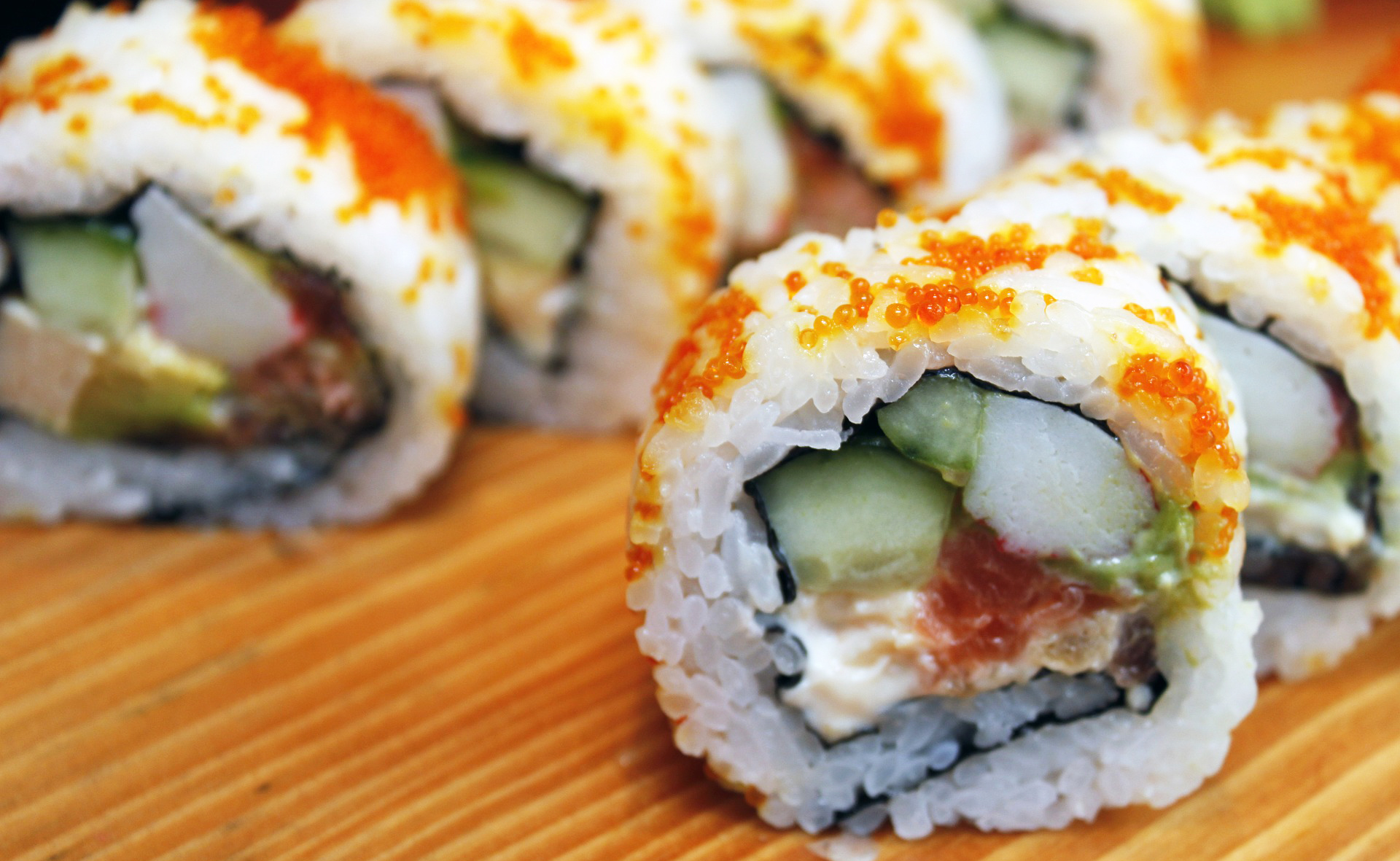 Eat sushi at a sushi train restaurant in osaka